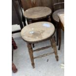 A PAIR OF VICTORIAN ELM AND BEECH STOOLS