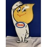 A METAL ESSO MAN CAVE/GARAGE SIGN