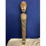 A WOODEN VINTAGE FERTILITY FIGURE