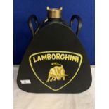 A BLACK 'LAMBORGHINI' PETROL CAN WITH BRASS LID