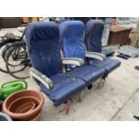 A VINTAGE THREE SEAT AIRLINE SEAT