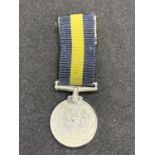 A MINIATURE DRESS MEDAL