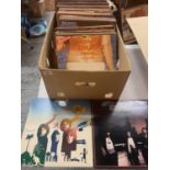 A LARGE QUANTITY OF RECORDS TO INCLUDE 'ABBA', 'THE BEEGEES' AND 'BRYAN FERRY'