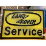 A 'LAND ROVER SERVICE' ILLUMINATED LIGHT BOX ADVERTISING SIGN