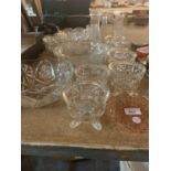A LARGE ASSORTMENT OF CUT GLASS WARE TO INCLUDE INDIVIDUAL SERVING BOWLS ETC