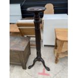 A VICTORIAN MAHOGANY TORCHERE