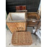 A WICKER HAMPER, A TEA CHEST, AN OAK PLANT STAND AND A VINTAGE CLOTHES PRESS