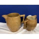 A PAIR OF LARGE BROWN CERAMIC JUGS WITH WORKING HORSE DESIGN