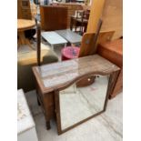 AN EARLY 20TH CENTURY OAK DRESSING TABLE