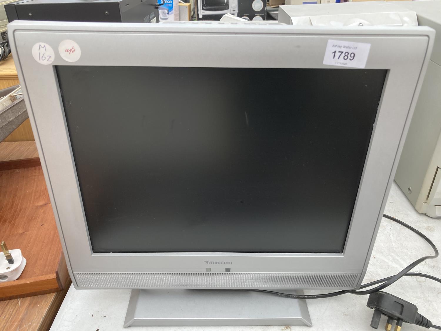 A 14" MIKOMI TELEVISION BELIEVED IN WORKING ORDER BUT NO WARRANTY