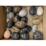 A BOX OF MARBLE EGGS