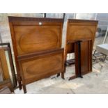 A PAIR OF EDWARDIAN SINGLE MAHOGANY BEDHEADS AND FEET