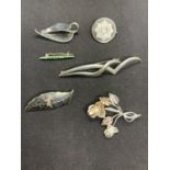 SIX SILVER BROOCHES