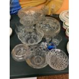 A LARGE COLLECTION OF CUT GLASS WARE TO INCLUDE TO INCLUDE A CADILLAC CAR AND PAPER WEIGHTS