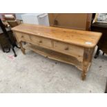 A VICTORIAN STYLE KITCHEN DRESSER BASE WITH THREE DRAWERS AND SHAPED POT BOARD, 72 INCHES WIDE