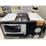 A DELTA MINI OVEN AND A BUFFALO SOUP KETTLE BELIEVED IN WORKING ORDER BUT NO WARRANTY