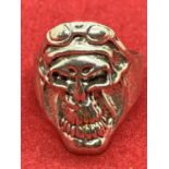 A WHITE METAL SKULL DESIGN RING