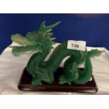 A JADE GLASS ORIENTAL DRAGON ORNAMENT