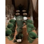 A GREEN COFFEE AND TEA SERVICE SET WITH GOLD DETAIL TO INCLUDE SUGAR BOWL AND MILK JUG ETC