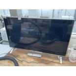 A 40" PANASONIC FLAT SCREEN TELEVISION WITH REMOTE CONTROL BELIEVED IN WORKING ORDER BUT NO WARRANTY