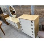 A SCHREIBER TEAK EFFECT MIRRORED DRESSING TABLE ENCLOSING SIX WHITE DRAWERS AND FIVE DRAWER CHEST