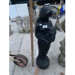 A BLACK PAINTED CONCRETE GARDEN STATUE