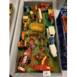 A LARGE QUANTITY OF TRACTORS AND FARM IMPLEMENTS IN A WOODEN TRAY