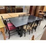 A SET OF SIX EBONISED ARTS & CRAFTS RUSH SEATED DINING CHAIRS WITH TURNED SPINDLE BACKS (2 CHAIRS