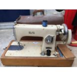 A VINTAGE ALFA CASED SEWING MACHINE