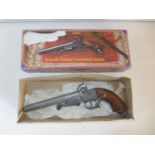 A BOXED REPLICA NON FIRING FRENCH DOUBLE BARRELED PISTOL