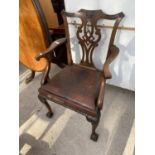 A MAHOGANY ARMCHAIR ON CARVED CABRIOLE SUPPORTS