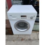 A HAIER WASHING MACHINE - BELIEVED WORKING BUT NO WARRANTY