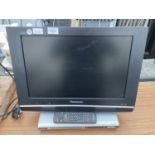 A 19" PANASONIC TELEVISION AND A PHILLIPS DVD PLAYER WITH REMOTE CONTROLS. BELIEVED IN WORKING ORDER