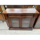 A VICTORIAN MAHOGANY BOOKCASE BASE ENCLOSING TWO ARCHED GLAZED DOORS, 41.5" WIDE