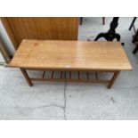 A RETRO TEAK COFFEE TABLE