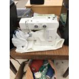 A VINTAGE JANOME SEWING MACHINE