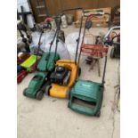 A PETROL LAWNMOWER, AN ELECTRIC MOWER AND A SCARIFIER
