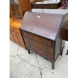 AN INLAID MAHOGANY BUREAU WITH FALL FRONT AND THREE DRAWERS