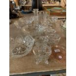 A LARGE ASSORTMENT OF CUT GLASS WARE TO INCLUDE INDIVIDUAL SERVING BOWLS ETC