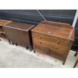 AN OAK DROP-LEAF DINING TABLE AND OAK TWO DRAWER CHEST WITH CUBPOARDS TO THE BASE