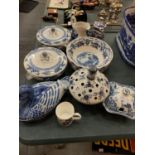 A LARGE ASSORTMENT OF BLUE AND WHITE CERAMIC WARE TO INCLUDE VARIOUS TUREENS AND A SAUCE DISH ETC
