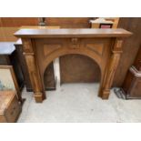 A CARVED OAK FIRE SURROUND