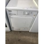 A WHITE MIELE HONEYCOMB CARE TUMBLE DRYER BELIEVED IN WORKING ORDER BUT NO WARRANTY