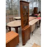 A MDOERN YEW WOOD CORNER CABINET WITH GLAZED UPPER PORTION