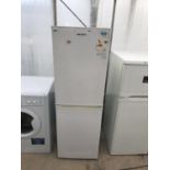 A WHITE BUSH UPRIGHT FRIDGE FREEZER BELIEVED IN WORKING ORDER BUT NO WARRANTY