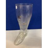 A LARGE HERFORDER PILS BEER GLASS IN THE SHAPE OF A BOOT