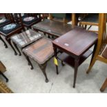 A MAHOGANY OCCASIONAL TABLE WITH LOWER SHELF, TWO MAHOGANY LAMP TABLES AND A MATCHING COFFEE TABLE