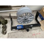 VARIOUS AUTO SPARES - A FORD ALLOY WHEEL AND A TOW BAR