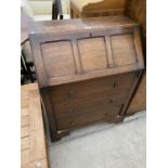 A MID 20TH CENTURY OAK BUREAU, 29" WIDE