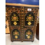 A MINIATURE DECORATIVE WARDROBE FOR THE STORAGE OF JEWELLERY ETC. TO INCLUDE NINE DRAWERS AND